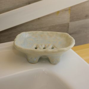 Seafoam soap dish on Bathroom sink